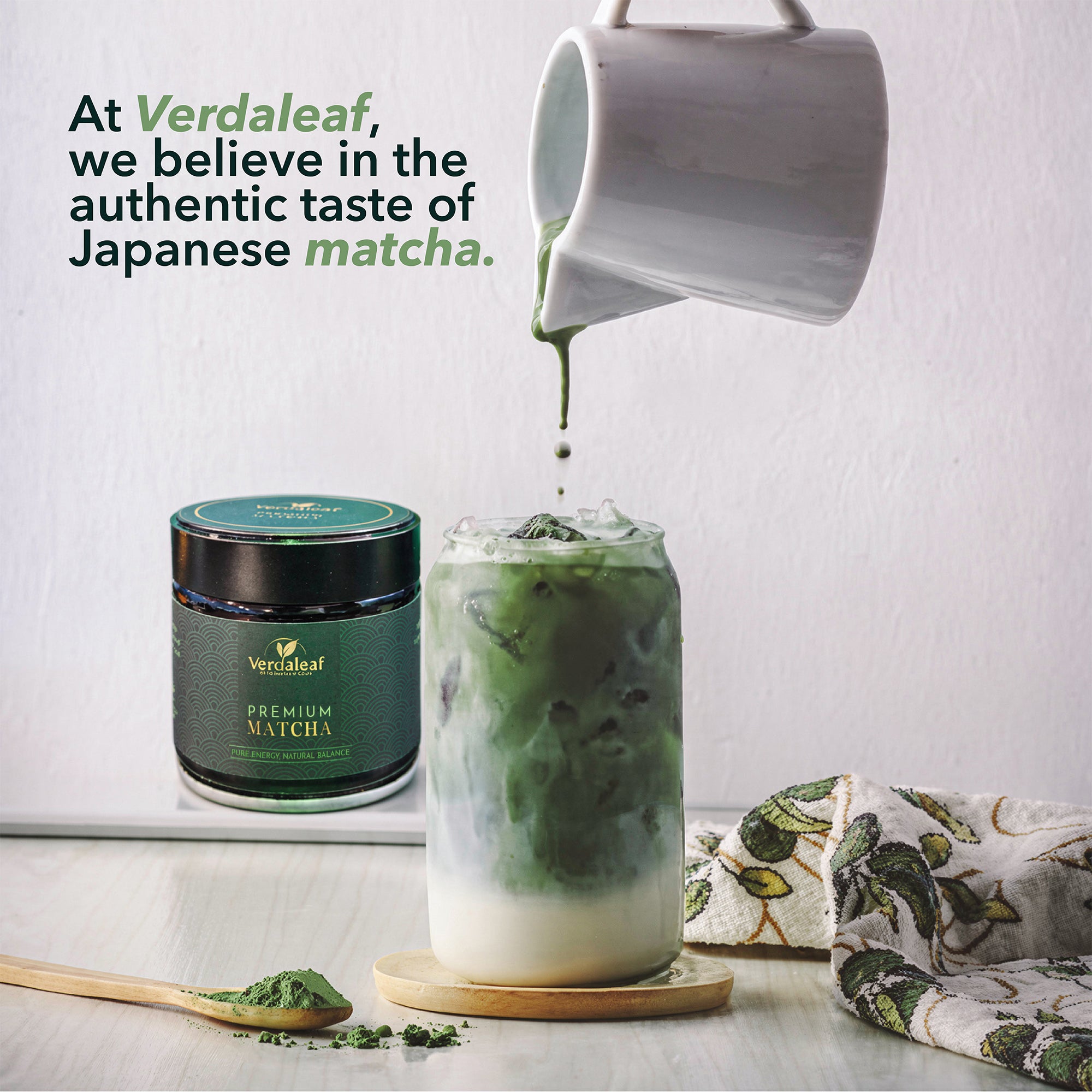 Verdaleaf matcha product with a glass of matcha being poured, on a light background.